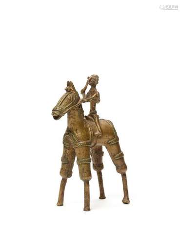 A BASTAR BRONZE WARRIOR ON A HORSE WITH DAGGER