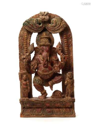 A LARGE INDIAN POLYCHROME WOOD RELIEF STELE DEPICTING GANESHA
