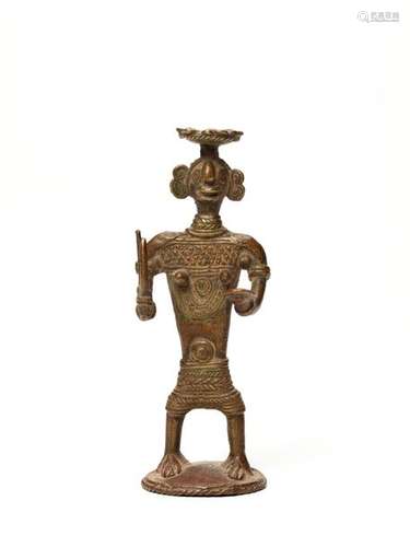 A BASTAR BRONZE OF A FEMALE DEITY WITH TRIDENT AND KHAPPAR