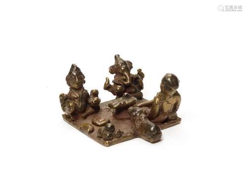 AN EARLY STATUE OF KRISHNA, LAKSHMI AND GANESHA COOKING RICE, INDIA, 16th-17th CENTURY