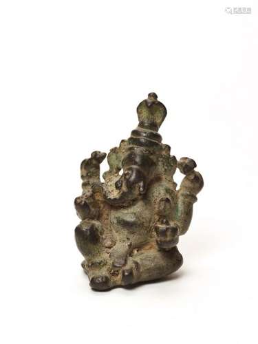 AN INDIAN MINIATURE BRONZE OF GANESHA, 15TH-17TH CENTURY