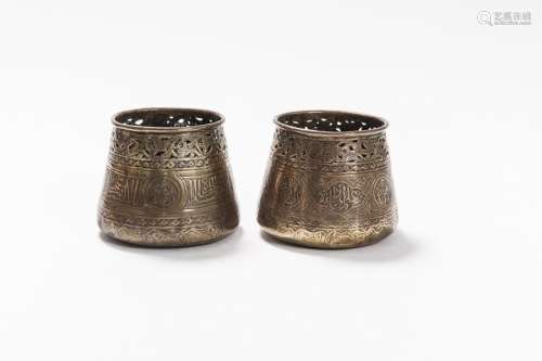 TWO DECORATIVE INDO-PERSIAN REPOUSSÉ COPPER CUPS, 19TH CENTURY