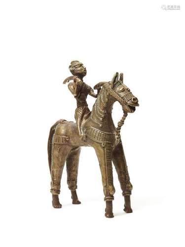 A BASTAR BRONZE WARRIOR WITH A SWORD ON HORSEBACK