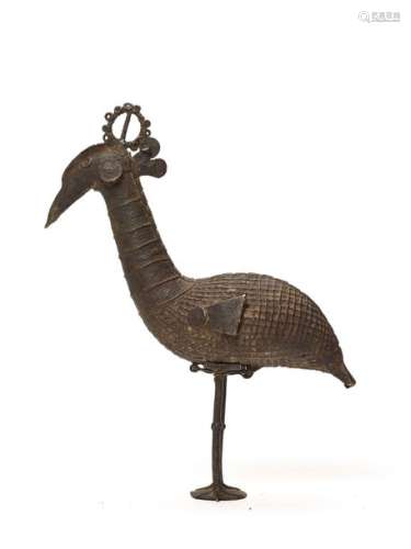 A LARGE AND RARE KONDH TRIBAL BRONZE OF A PEACOCK
