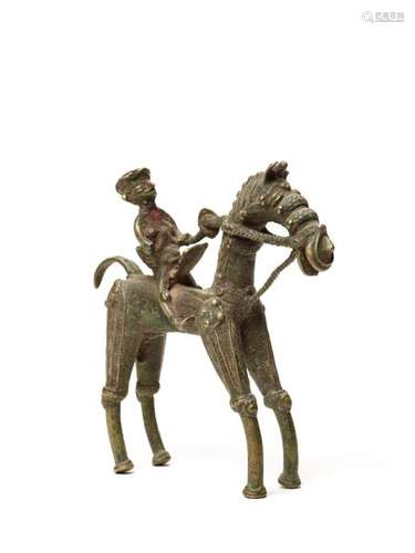 A BASTAR BRONZE WARRIOR WITH A SHIELD ON HORSEBACK