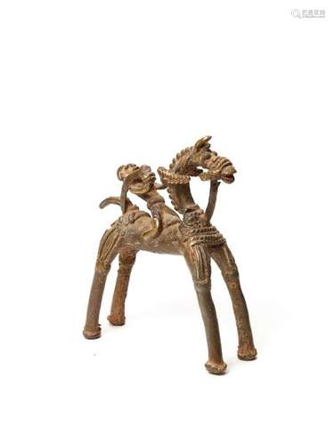 A BASTAR BRONZE WARRIOR WITH A SCIMITAR ON HORSEBACK