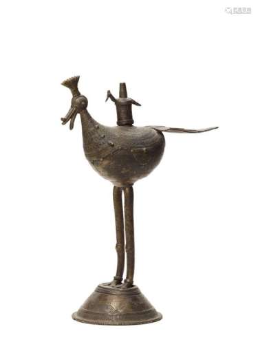 A BASTAR BRONZE OF A BIRD WITH LONG FEATHERS