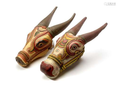 A PAIR OF PAINTED NANDI HEADS – INDIA 19th / 20th CENTURY