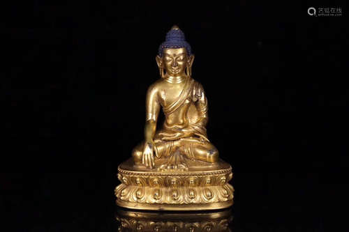 A COPPER GLIT SAKYAMUNI BUDDHA