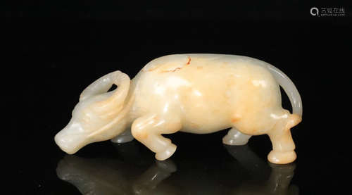 A HETIAN JADE CATTLE SHAPED PENDANT