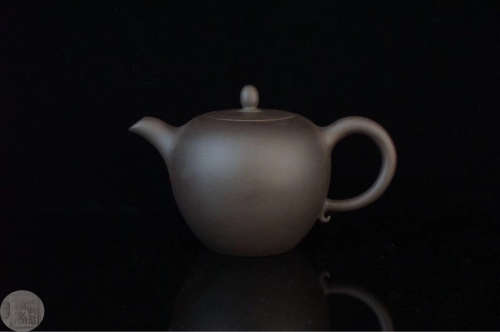 AN OLD ZISHA TEAPOT