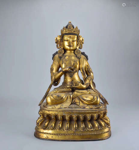 A COPPER GILT SATTVA BUDDHA