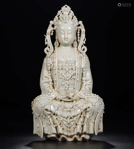 A QINGBAI CELADON GUANYIN FIGURE