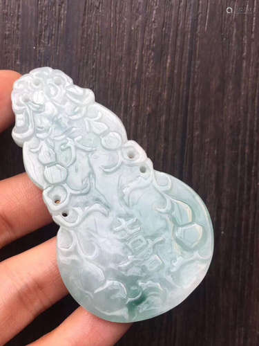 A JADEITE GOURD SHAPED PENDANT