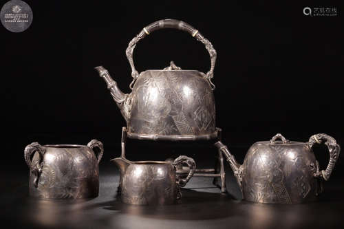 SET OF SILVER MOLDED TEA UTENSILS