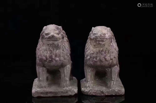 A PAIR OF BLUESTONE LIONS