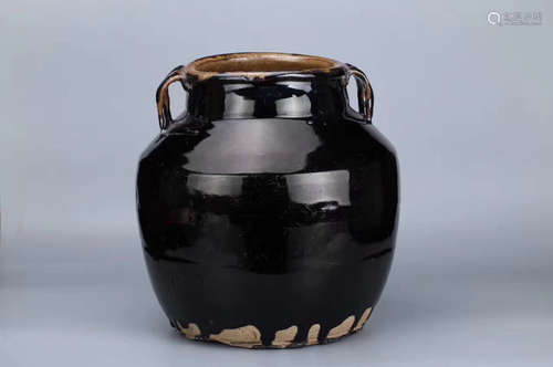 A BLACK-GLAZED PORCELAIN WINE JAR