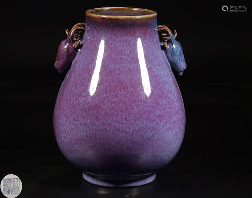 A FLAMBE-GLAZED DEER-SHAPE-EARS VASE