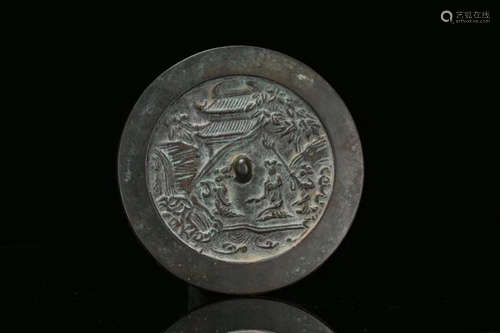 A FIGURE CARVED COPPER MIRROR