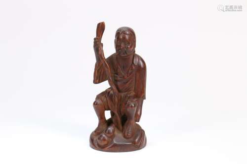 A Chinese Carved Wood Figural Decoration