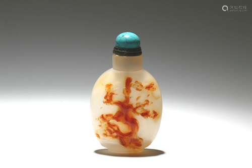 A Chinese Carved Agate Snuff Bottle