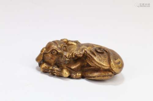 A Chinese Carved Gilt Bronze Animal Decoration