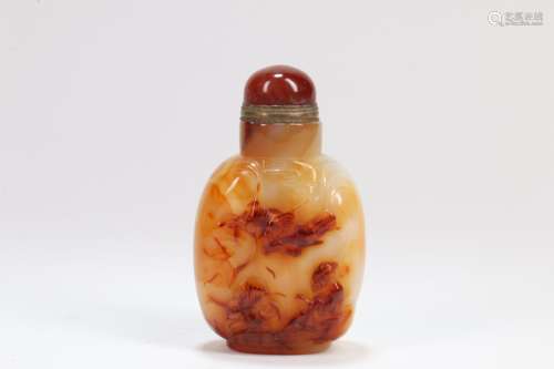 A Chinese Carved Agate Snuff Bottle