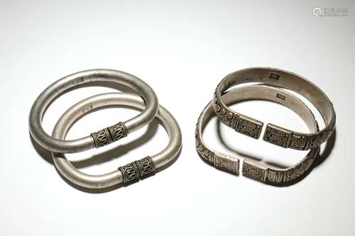 Two Pair of Chinese Carved Silver Bracelets