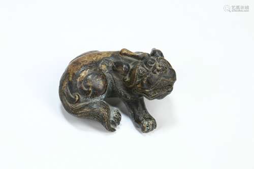 A Chinese Carved Gilt Bronze Animal Decoration