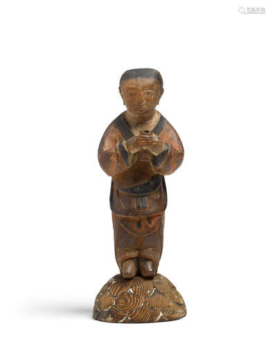 Joseon dynasty (1392-1897), late 19th century Small painted wood figure of a dongja (boy attendant)