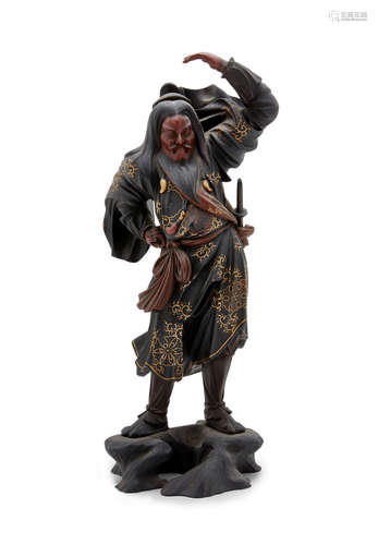 Meiji era (1868-1912), late 19th century A Wood figure of a mythical figure, possibly Izanagi