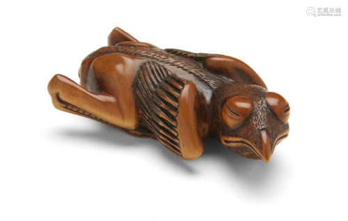 A wood netsuke of a hatchling bird, circa 1970 Jack Coutu (1924-2017)