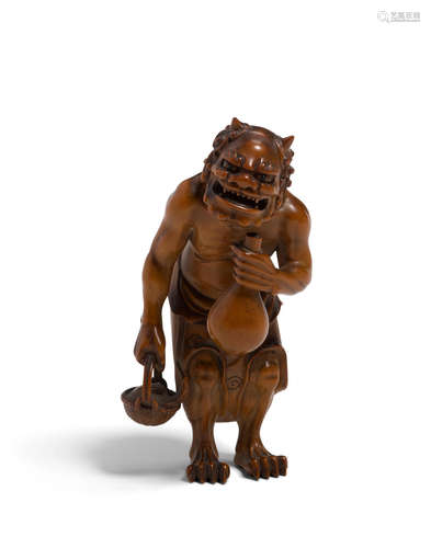 Edo period (1615-1868) or Meiji era (1868-1912), mid/late 19th century Small wood figure of a demon