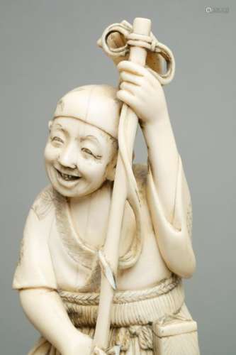 Okimono en ivoire représentant un pêcheur harponna…