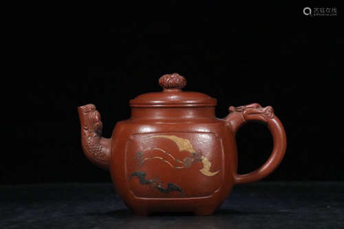 A DOUBLE DRAGON DESIGN PURPLE CLAY TEAPOT