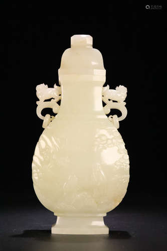 17-19TH CENTURY, A LION PATTERN HETIAN JADE BOTTLE, QING DYNASTY