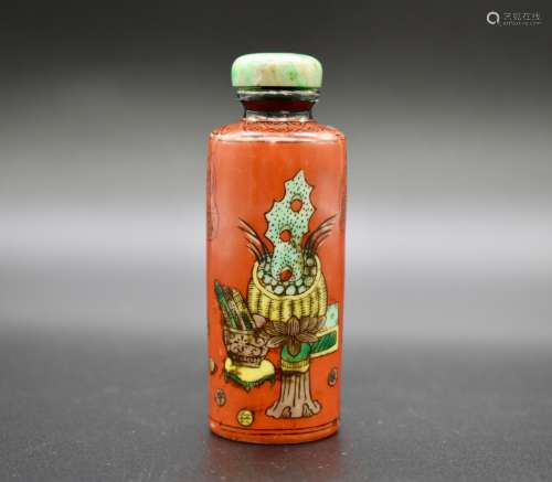 A Guangxu Mark and Period coral red-ground snuff bottle