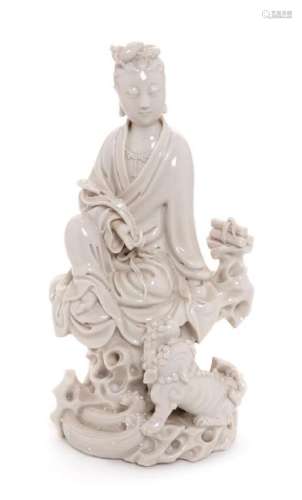 * A Blanc-de-Chine Porcelain Figure of Guanyin Height 9