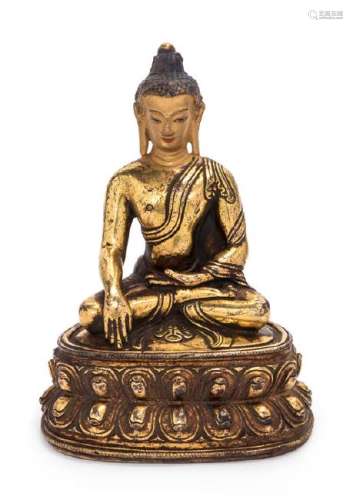 A Sino-Tibetan Gilt Bronze Figure of Shakyamuni Buddha