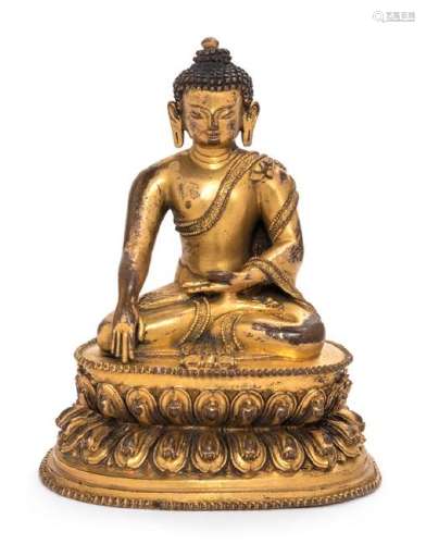 A Sino-Tibetan Gilt Bronze Figure of Shakyamuni Buddha