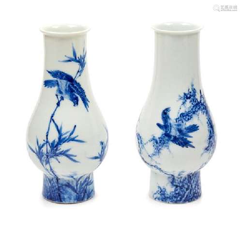 Two Blue and White Porcelain Vases Height 7 inches.