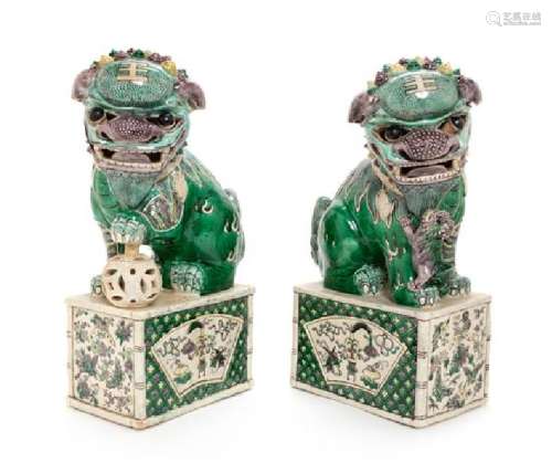 A Pair of Famille Verte Porcelain Figures of Fu Lions