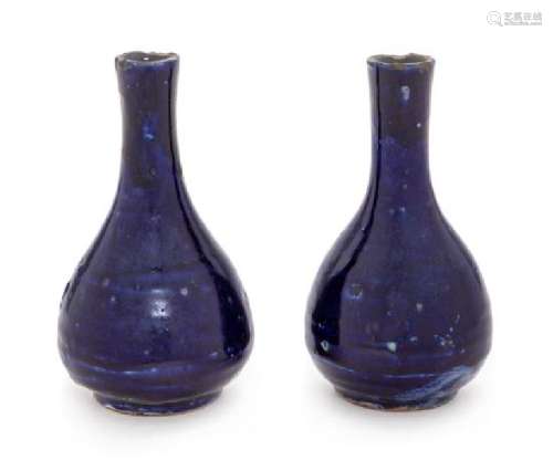 * A Pair of Blue Glazed Porcelain Bottle Vases Each
