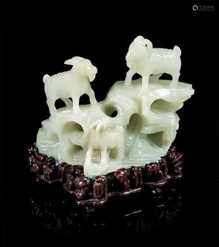 * A White Jade Carving of Three Rams Height 4 1/8