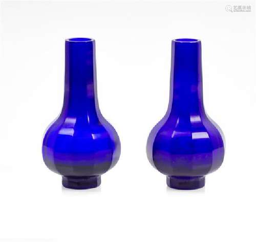 * A Pair of Cobalt-Blue Glass Faceted Bottle Vases