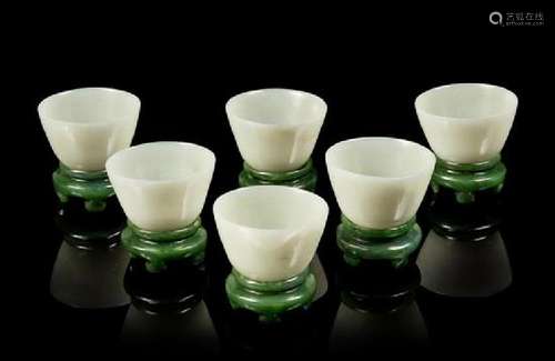 * A Set of Six Celadon Jade Wine Cups and Stands