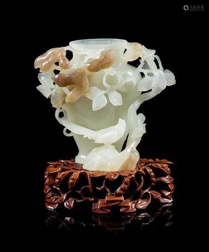 * A White and Russet Jade Vase Height 3 1/2 inches.