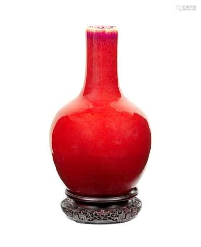 * A Copper Red Glazed Porcelain Bottle Vase Height 14