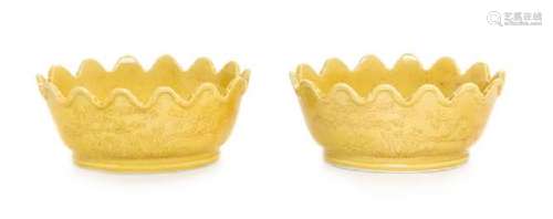 A Pair of Yellow Glazed Porcelain Floriform Vessels