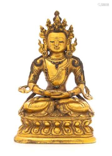 A Sino-Tibetan Gilt Bronze Figure of Amitayus Height 6